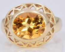 A 14ct gold ring set with a citrine in a geometric mount, 5.5g, size L