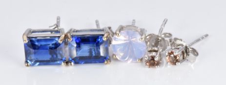 A pair of 9ct white gold earrings set with synthetic sapphires and a pair of 9ct white gold earrings