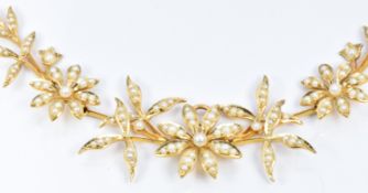 Edwardian 15ct gold necklace made up of floral shaped links set with seed pearls, in original Mappin