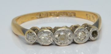 An 18ct gold ring set with diamonds, 2.2g, size O