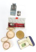 Two hallmarked silver napkin rings, a silver spoon, three Stratton compacts and a glass scent