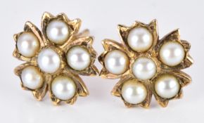 A pair of yellow metal Victorian earrings set with split pearls, 2.3g