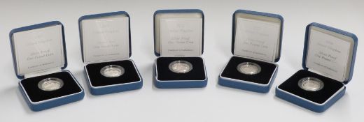 Five Royal Mint silver proof £1 coins, two 2005, a 2006 and two 2007 examples, cased with