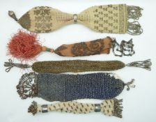 Five 19thC embroidery, beadwork, cut steel purses including misers', some with cut steel/filigree