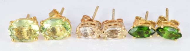 Three pairs of 9ct gold earrings set with tourmaline, quartz with rutile inclusions and peridot