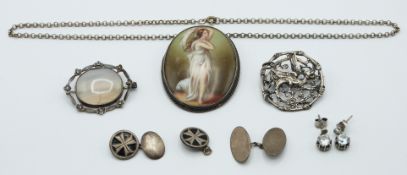 A collection of silver jewellery including Victorian brooch, cufflinks, paste earrings and painted
