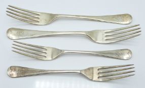 Four George V hallmarked silver Old English pattern forks comprising two dinner and two dessert,