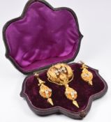 Victorian Etruscan Revival yellow metal cased brooch (W- 3.5cm x L- 7cm) and earrings set with