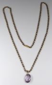Victorian 9ct gold guard chain/ necklace made up of oval faceted links with an amethyst pendant,