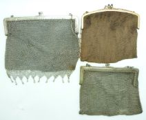 Three plated silver mesh purses including gold coloured, one dated 1916, largest 17 x 18cm
