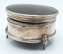 George V hallmarked silver tortoiseshell lidded dressing table trinket pot with padded interior,