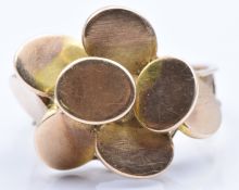 A 9ct gold ring in the form of a stylised flower, 3.0g, size N
