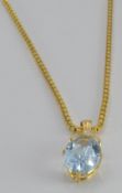 A 9ct gold chain/ necklace (10.5g) with an 18ct gold pendant set with an aquamarine and cubic