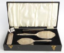 Broadway & Co hallmarked silver mounted dressing table set comprising hand mirror, two brushes and