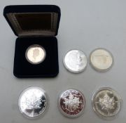 Six various Canada dollars including five silver examples, a 1967 commemorative 80% silver and a