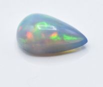 A 3.55ct pear cut black opal cabochon