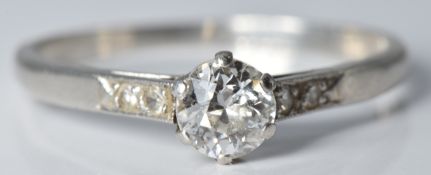 Art Deco platinum ring set with a diamond of approximately 0.3ct, with diamond encrusted