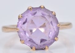 A 9ct gold ring set with a round cut amethyst, 3.3g, size H/I
