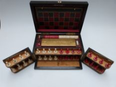 Coromandel cased games compendium, with tooled leather board to lid, chess pieces to front,