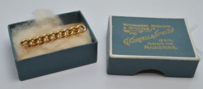 A 15ct gold curb link brooch, 3.4g