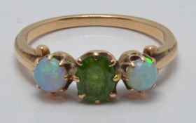 Victorian ring set with a demantoid garnet and two opals, size O