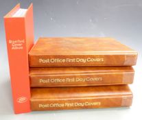 Three specialist Post Office first day cover albums (one empty) and a Stamford cover album of GB