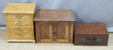 An oak cabinet, wooden box with leather handle and key and an apprentice style chest of drawers,