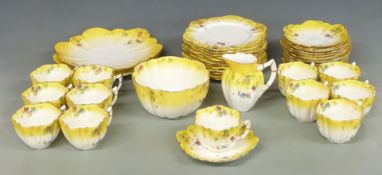 Foley Wileman and Co tea ware comprising twelve trios, two large plates, jug and bowl in the Daisy