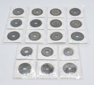 Eighteen Chinese coins/ tokens