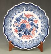 Spode limited edition of 750 charger from the Statements Series 'Red Flowers' with wooden stand,