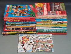 Twenty-eight sport and football related annuals and books including Manchester United, Roy of the