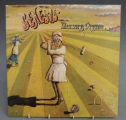 Genesis - Nursery Cryme (CAS1052) A1/B2, pink scroll label, record and cover appear at least Ex