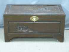 A 20thC Chinese carved camphor wood lined chest, W84 x D44 H50cm