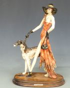 Santini Art Deco style figurine with dog on wooden base, H44cm