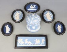 Wedgwood Jasperware plaques and a covered pot, tallest 13cm, rectangular plaque 6 x 17cm, oval 10