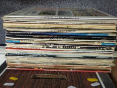 Approximately 35 albums including soundtracks and Bob Dylan