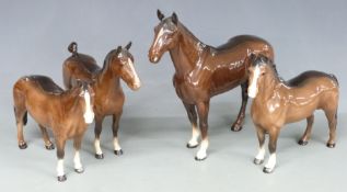 Four Beswick Horses including The Winner, brown Hackney, Welsh Cob and Huntsman's Horse, tallest