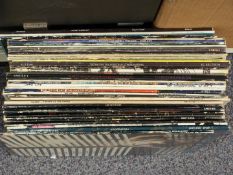 Approximately 30 albums including Queen, Siouxsie and The Banshees, Bauhaus, The Cure, X Mal