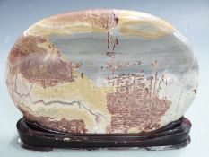 A polished agate tablet on stand, L33 x H26cm