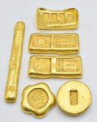 Six Chinese gold coloured metal trade tokens/ ingots
