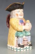 A 19thC Ralph Wood style foaming quart Toby jug, H23cm