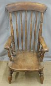 19thC elm seated Windsor armchair, H109cm