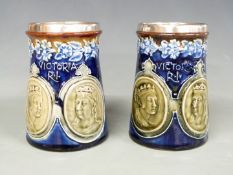 A pair of Doulton Lambeth Queen Victoria Golden Jubilee commemorative tankards with hallmarked