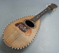 Italian round backed mandolin indistinctly signed to table, labelled Phebe inside, with bone