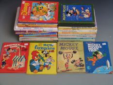 Forty-three Cartoon annuals including Mickey Mouse, Looney Tunes, Postman Pat, Disney etc.