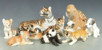 A collection of Lomonosov / USSR animal and bird figures, including a leopard, tiger etc, tallest