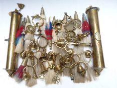 A collection of heavy horse brass finials, bells and plumes including 19thC examples