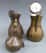 Two brass dallahs, H30cm