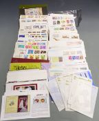 A quantity of loose Channel Island and Isle of Man first day covers