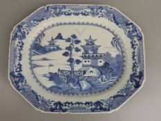 A 19th/ 20thC Chinese blue and white octagonal platter decorated with a coastal scene, 40.5 x 33cm